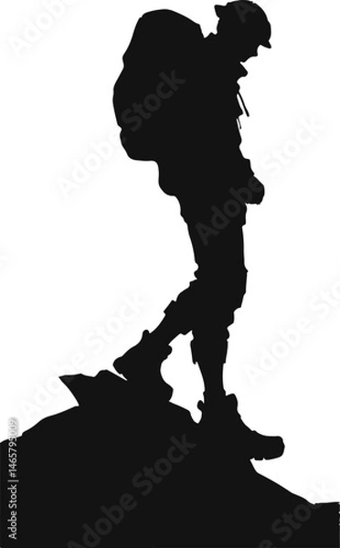 Fototapeta Silhouette of a hiker standing on a rocky surface, wearing a backpack and helmet, symbolizing adventure, exploration, and outdoor trekking