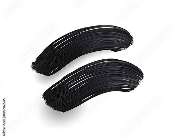 Obraz Two curved black strokes, possibly makeup, against a white background.  Shows texture and application
