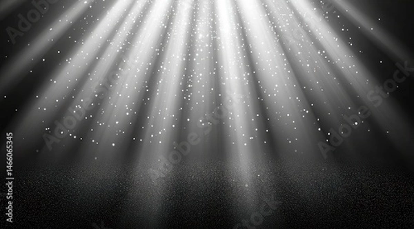 Fototapeta Bright light rays radiate from above, illuminating a dark space  Particles of light scatter throughout