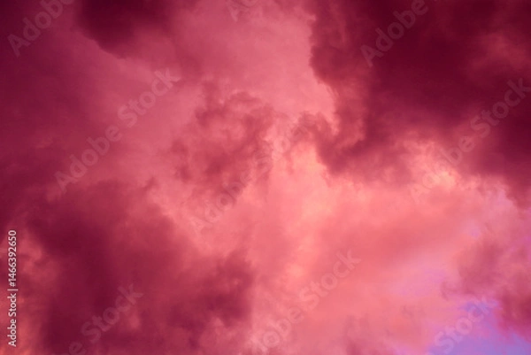 Obraz Fiery red storm clouds with dramatic lighting. Red storm clouds background. Dramatic red sky.