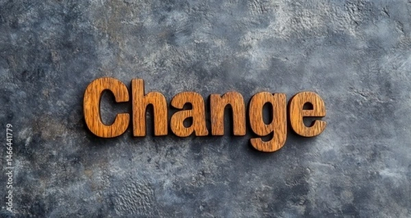 Obraz The word change is written in wood on a grey background. The word change is written in a way that it looks like it is carved out of the wood