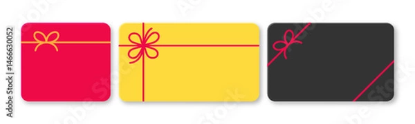 Fototapeta Set of blank colored gift cards with decorative bows, ideal for sales events, bonus offers, or certificates. Includes black, red, and yellow cards viewed from the top on a white background.