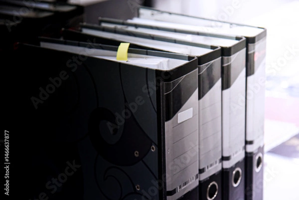 Fototapeta Office folders with papers and documents in the office. Office binders