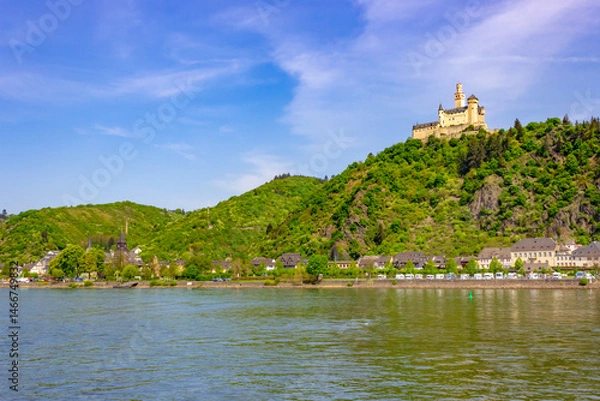 Fototapeta View of Marksburg (Marks Castle) on a hill with the town of Braubach along the Rhine River, Germany