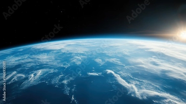 Obraz An awe-inspiring view of Earth from space, showcasing its stunning blue atmosphere, swirling clouds, and the radiance of the sun rising in the distance. A captivating sight.