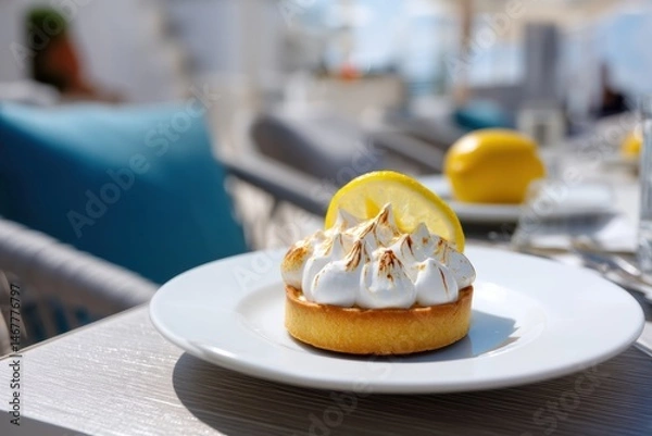 Fototapeta Lemon Tart With Meringue Served on a Terrace Table in Bright Sunlight Generative AI
