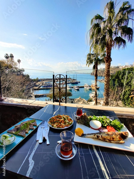 Obraz a delicious breakfast of various dishes in Turkish with a view of the sea