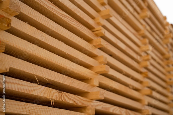 Fototapeta Diagonal closeup of wooden board edges showing saw marks and fibers