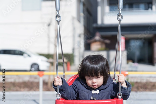 Obraz ブランコに乗る日本人の女の子