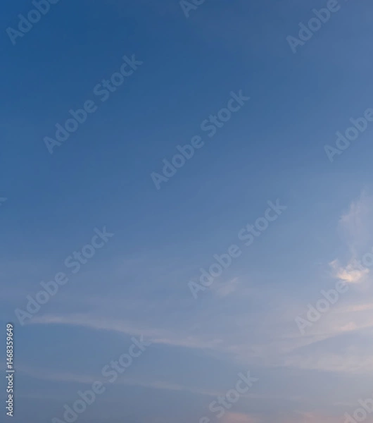 Fototapeta Front view and full frame of beautiful morning or evening blue and orange sky with cloudy while sunsets or sunrises taken at the sea used as natural blackground texture