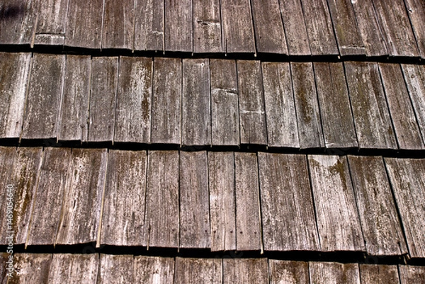 Fototapeta  of an old roof of a Ukrainian hut covered with planks nailed with iron nails