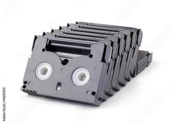 Fototapeta A few old Hi-8 video tapes stack inline with white bakground