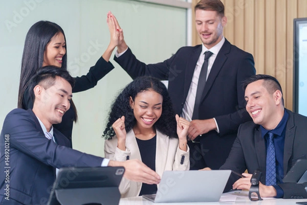 Obraz multiracial business people meeting at table in office room,doing gesture sign of success business,applause,hands high five,hands fist and smile happily