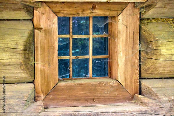 Fototapeta  a small square window in an old wooden house of a wealthy Ukrainian peasant