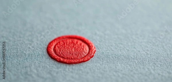 Obraz Closeup of legal document featuring red wax seal on textured paper, symbolizing authenticity and formality. vibrant color contrasts with soft background, creating striking visual