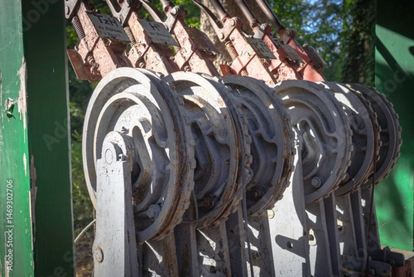 Fototapeta A row of old, rusty, and dirty switches are lined up