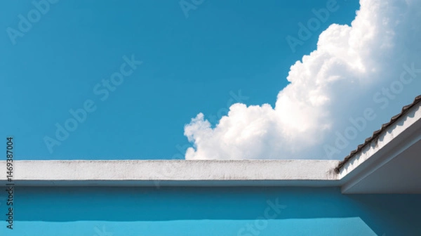 Obraz Corner of a building under a blue sky