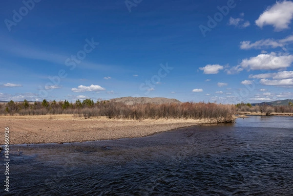 Obraz Fast flowing river in spring. Siberia