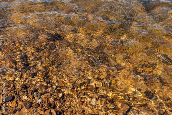 Obraz sandy and pebbles bottom of a freshwater river
