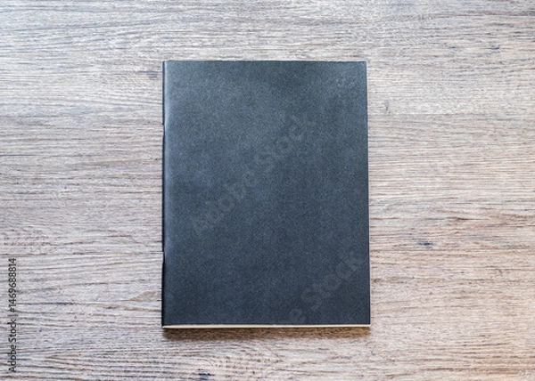 Fototapeta Book mockup blank black A4 leather cover for magazine, booklet, brochure, menu, diary mock-up design template on wooden table background