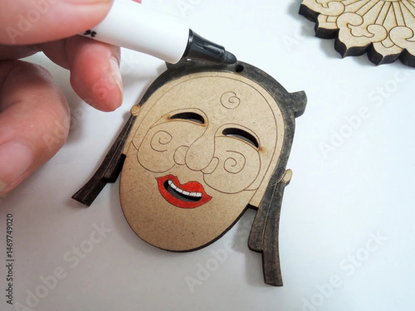 Fototapeta Korean traditional Hahotal masks, handmade and in the process of being painted