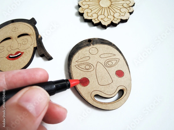 Fototapeta Korean traditional Hahotal masks, handmade and in the process of being painted