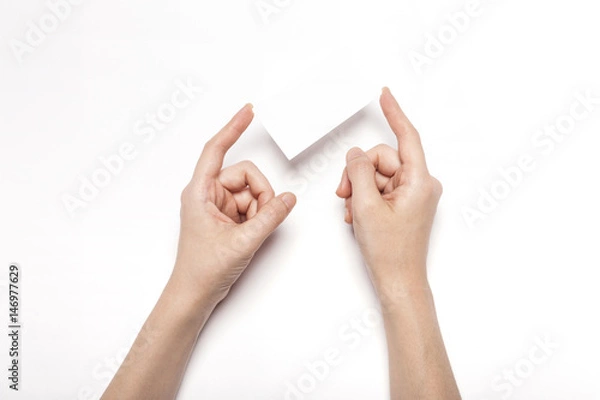 Fototapeta woman hand hold a name card isolated white.