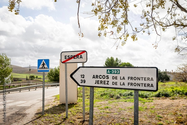 Fototapeta traffic signpost leaving Espera pointing the way and distance to Arcos de la Frontera and Jerez de la Frontera, province of Cádiz, Andalusia, Spain