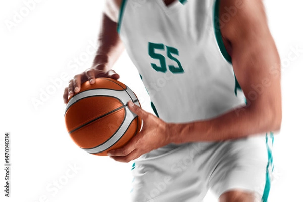Fototapeta Basketball close-up. Professional basketball player preparing to attack. Focus on the ball. Isolated on a white background