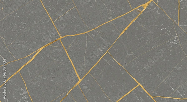 Fototapeta A close up of gray marble with gold veins running through it creating a luxurious and elegant texture