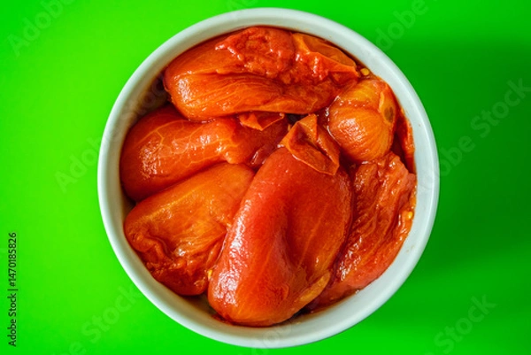 Fototapeta Bowl Of Healthy Cooked Plum Tomatoes With Skin Removed