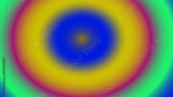 Fototapeta Abstract concentric circles in vibrant, blurred hues of red, yellow, green, and blue, creating a hypnotic effect