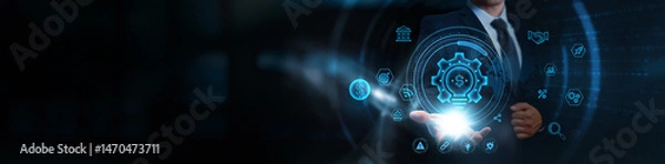 Fototapeta Finance technology, businessman holding the Financial icon, business and digital payment network, blockchain-based transactions, AI for financial analytics, cloud infrastructure for secure banking.