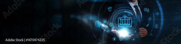 Fototapeta Online Banking, businessman holding financial transaction and mobile banking icons, business and digital payment solutions network, secure account management systems, customer authentication platforms