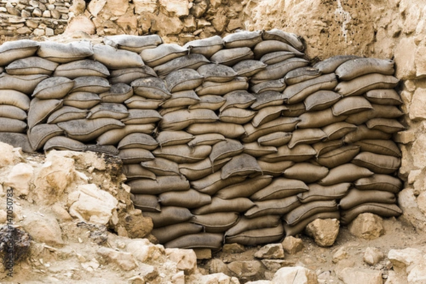 Fototapeta Стена из мешков