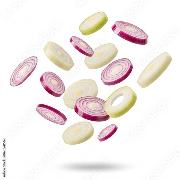 Fototapeta Red and white onion slices, falling, isolated on white background.