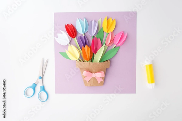Obraz DIY paper flower craft with scissors and scattered petals on purple background, ideal for school projects, Mothers Day lessons, kids workshops, and family creativity time.