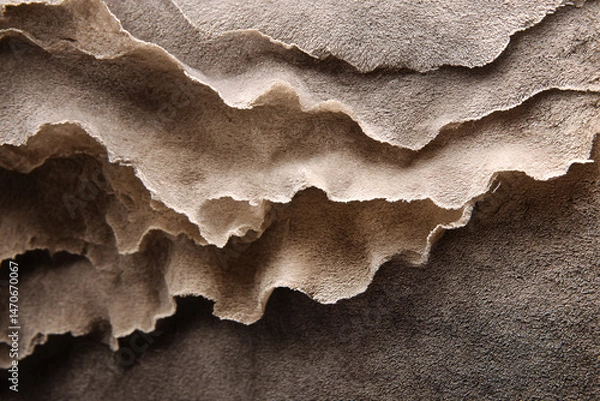 Fototapeta Abstract Paper Layers: A close-up study of layered paper, showcasing textures, shapes, and the inherent elegance of handmade craftsmanship.