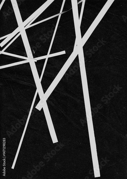 Fototapeta Angular white paper strips crossing each other over a black backdrop. Modern abstract composition with sharp line movement and intersecting points.