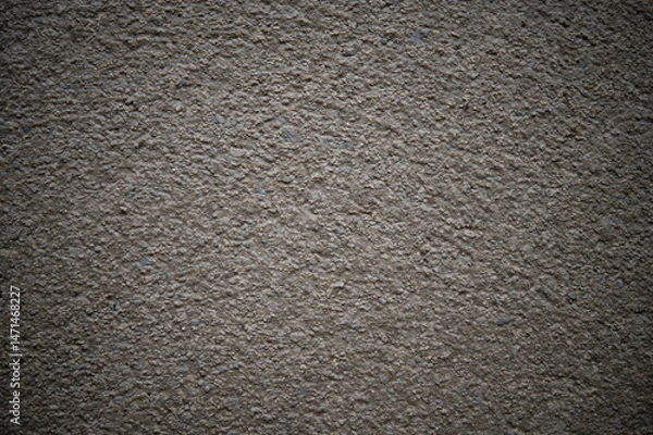 Fototapeta Gray background of concrete floor mixed with small stone chips.