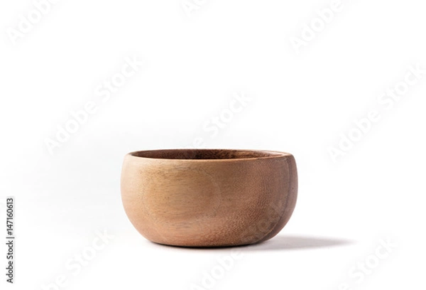 Fototapeta Side view of acacia wood bowl for ideal for fruits and salads on a white background