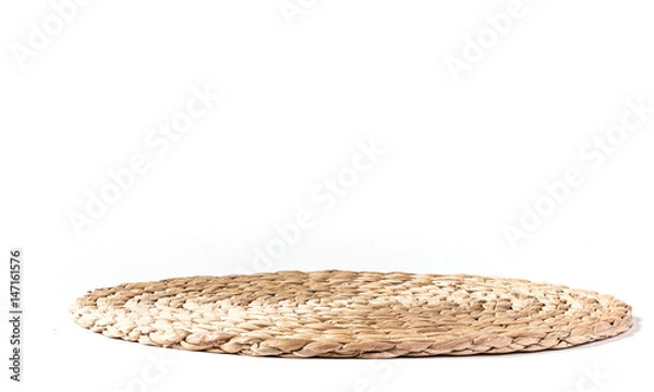 Fototapeta Side view of a beige place mat on a white background