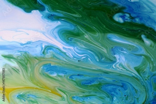 Fototapeta 
Abstract blue-green background. Acrylic paint spreads freely and creates an interesting pattern. Texture, background, abstraction, painting. Background for the cover of a notebook or laptop

