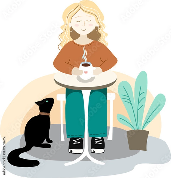 Fototapeta A woman with a cup of coffee is resting at a table. A black cat is sitting under the table.
