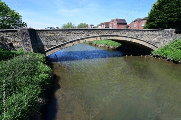 Fototapeta Road Bridge crossing the River Arun at Pulborough, West Sussex. 