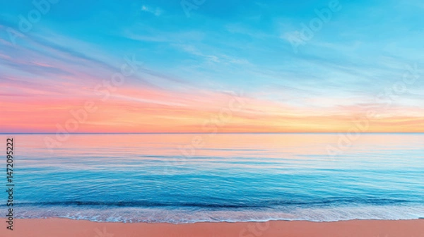 Obraz Peaceful calm ocean with gentle waves and colorful sunset sky over horizon creating serene atmosphere