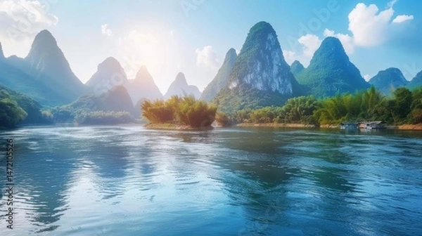 Fototapeta Landscape of Guilin, Li River and Karst mountains. Located near Yangshuo County, beautiful mountain range with a river running through it. water is calm and clear, trees are lush and green