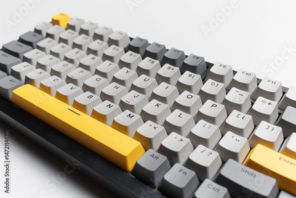 Fototapeta Mechanical keyboard for computer on white background. Key cap of grey, black and yellow colours.