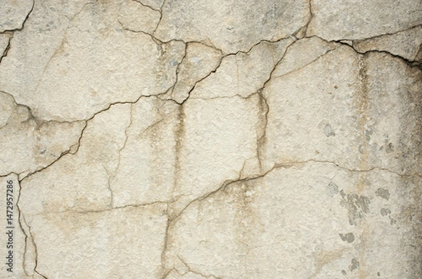 Obraz Cracked Wall Texture: Grungy, aged surface. Distressed concrete with broken paint. Ideal for retro or rustic designs.