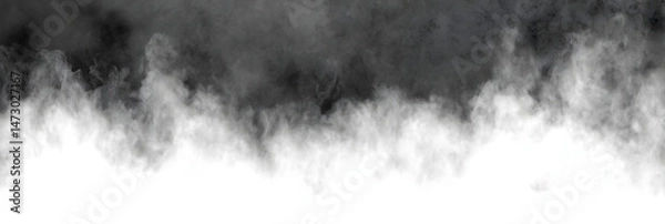 Fototapeta Fog covers a mountainous terrain during the early morning hours creating a mysterious atmosphere for hikers and nature enthusiasts